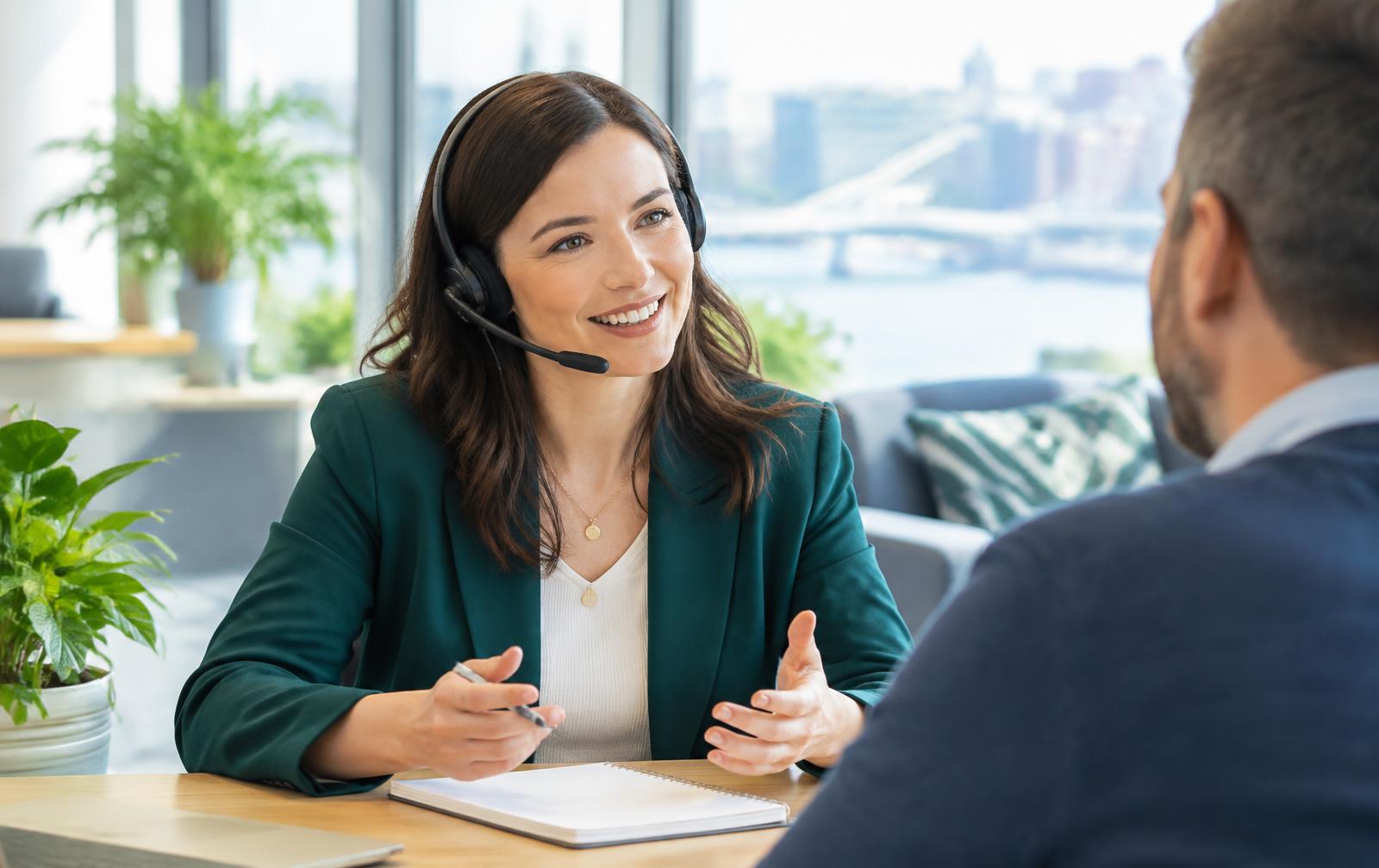 A LINHILL FX specialist speaking with a client